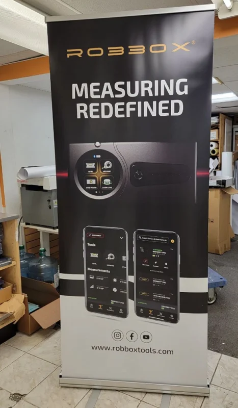 Modern roll up banner for Robbox smart measuring tools featuring app interface and product image