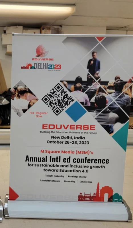 printing Roll up banner for Eduverse 2023 education conference in New Delhi featuring QR code and speaker graphic