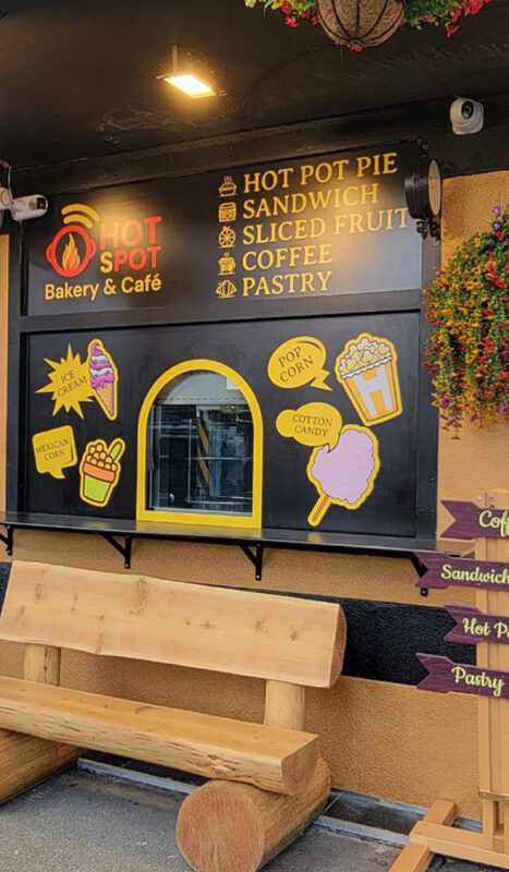 Opaque window decals with vibrant colours used for a local juice bar’s glass signage in Vancouver.