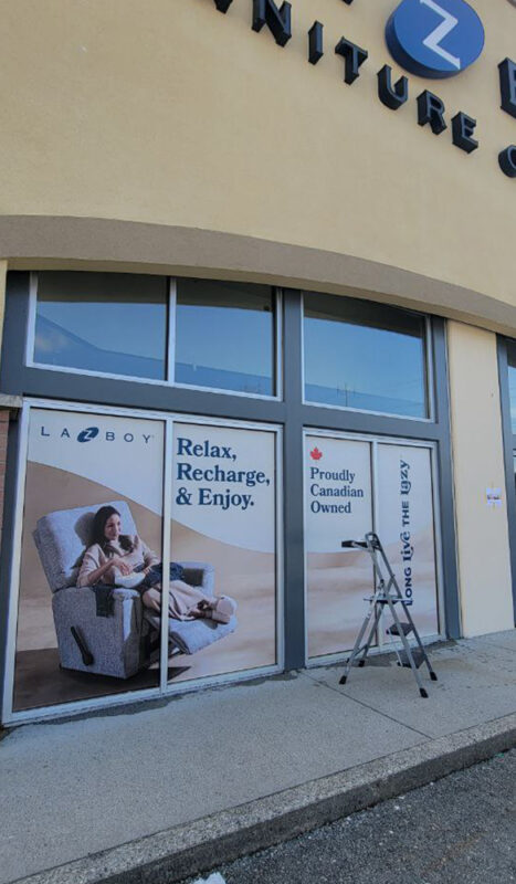 Vinyl window stickers combining logo, text, and decorative patterns for a food shop opening soon in Vancouver.